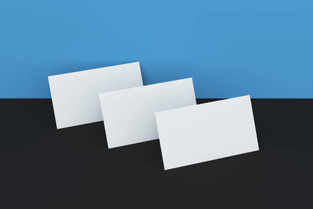 istock White blank business cards mock-up on black and blue background 683539998
