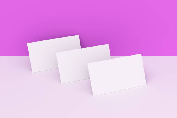 istock White blank business cards mock-up on white and violet background 683549332