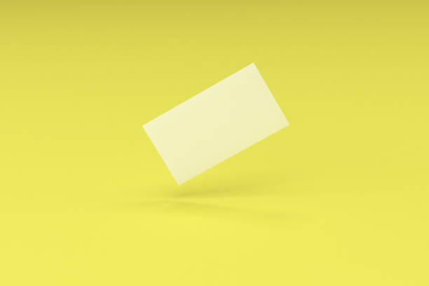 istock White blank business cards mock-up on yellow background 683552060