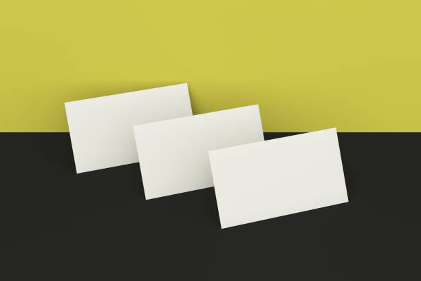 istock White blank business cards mock-up on black and yellow background 683552348