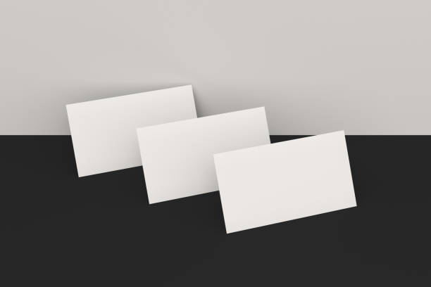 istock White blank business cards mock-up on black and white background 683553606