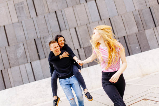 istock Group of young people having fun outdoors 683558656