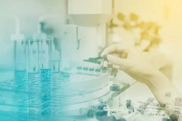 Photo of Double exposure of scientist with equipment and science experiments