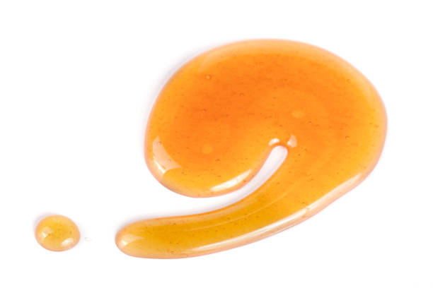 istock Honey stain isolated on a white background 683568412