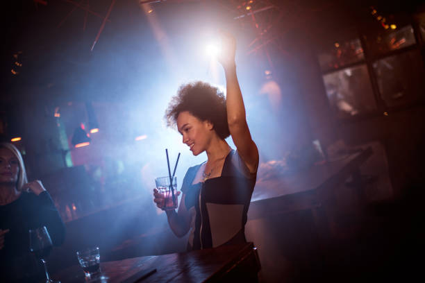 istock Woman dancing in the club 683569032