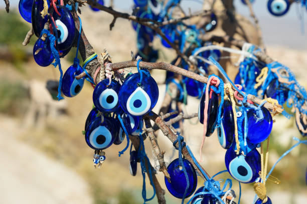 istock Nazars, Turkish Evil eye charms on the tree. Cappadocia. Turkey 683574802
