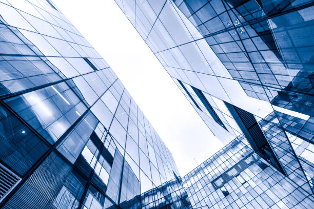 istock Contemporary glass skyscraper reflecting the blue sky 683575188