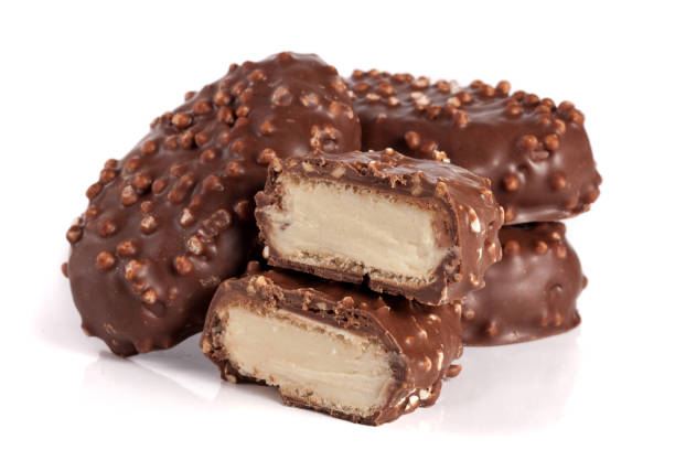 istock chocolate candy with white cream filling isolated on white background 683578544