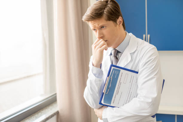 istock doctor holding diagnosis 683585956