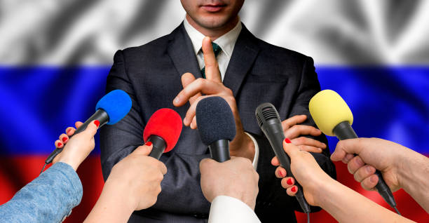 istock Russian candidate speaks to reporters - journalism concept 683597498