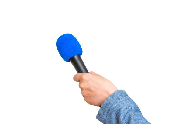 istock Hand of reporter with blue microphone isolated on white 683608334