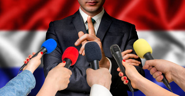 istock Dutch candidate speaks to reporters - journalism concept 683608470