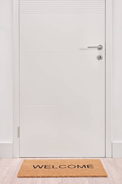 istock Doormat in front of a door 683609528