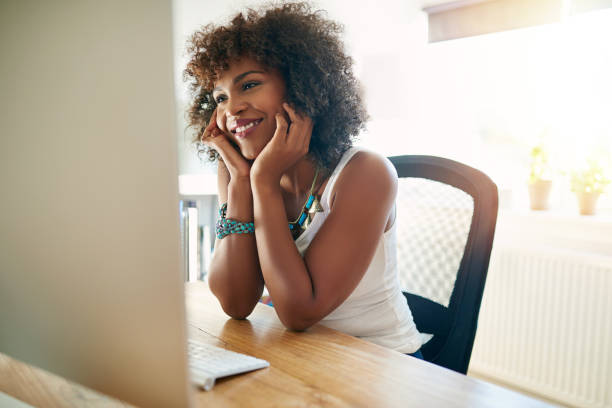 istock Happy young businesswoman working from home 683617086