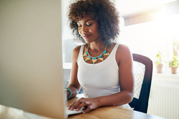 istock Stylish young businesswoman typing on a computer 683617124