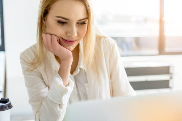 istock Pleasant elegant girl working at light office 683627650