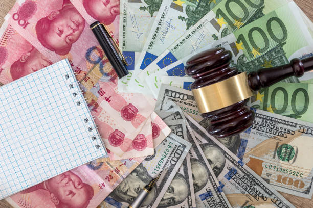 istock US dollar and Euro, yuan  banknotes as background 683627742