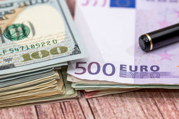 istock Dollar vs euro notes as background for business concept. 683628752