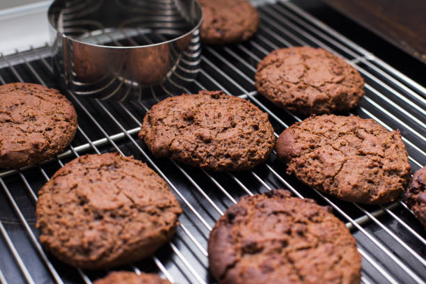 istock baked chocolate cookies laying on a rack 683632844