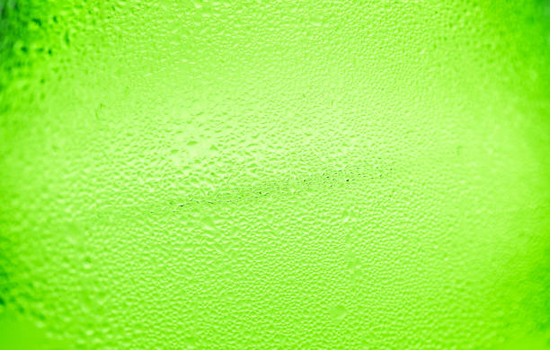 istock Green Abstract Water Drops Background,Natural water drops on glass,water drop texture 683633650