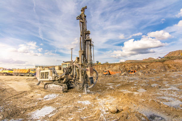 istock Outdoor quarry with heavy machinery 683670588