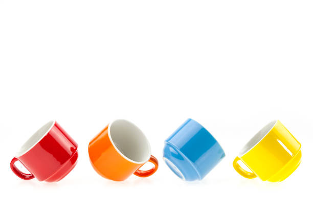 istock colorful coffee cups isolated on white background. 683670788