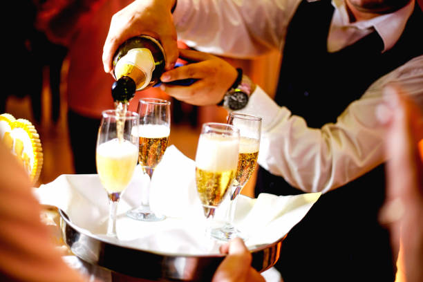 istock Cheers! Group of people cheering with champagne 683681402