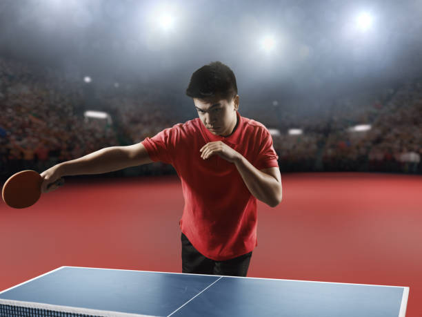 istock Young asian ping pong player playing table tennis game 683684452