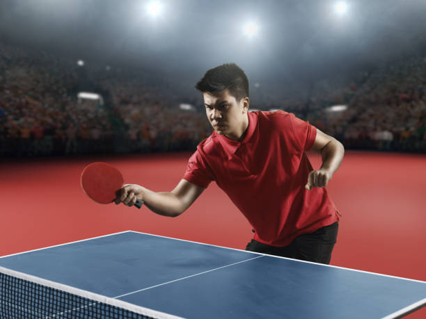 istock Young asian ping pong player playing table tennis game 683684458