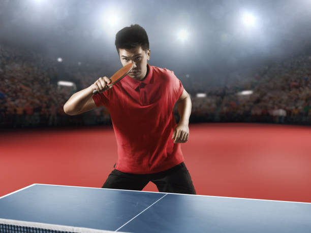 istock Young asian ping pong player playing table tennis game 683684462