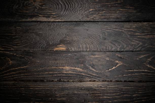 istock Dark wooden rough oak background. Vignette. Copyspace 683705296