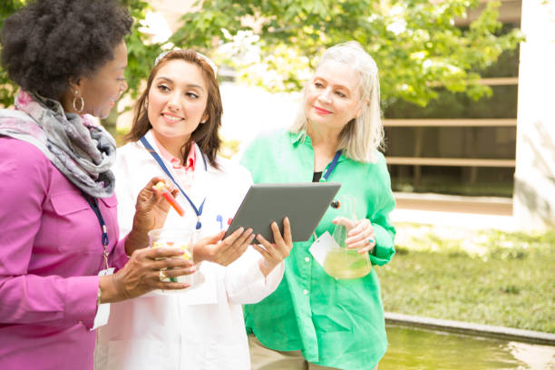 istock STEM themes with female scientists working on water project outdoors. 683707558