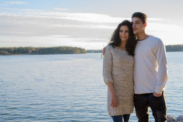 Beautiful young couple outdoors in nature
