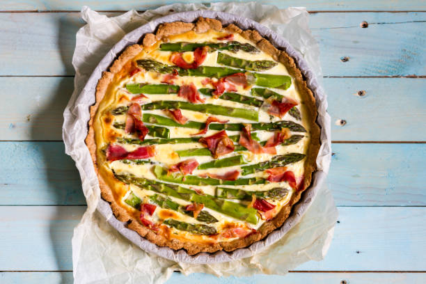 istock Green asparagus tart with leek and Parma ham. 683712068