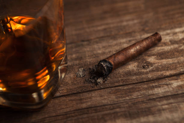 istock Cigar on the table with glass of whiskey 683713342