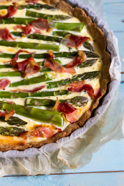 istock Green asparagus tart with leek and Parma ham. 683715046