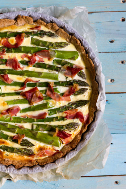 istock Green asparagus tart with leek and Parma ham. 683715178