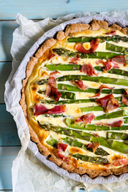 istock Green asparagus tart with leek and Parma ham. 683715308