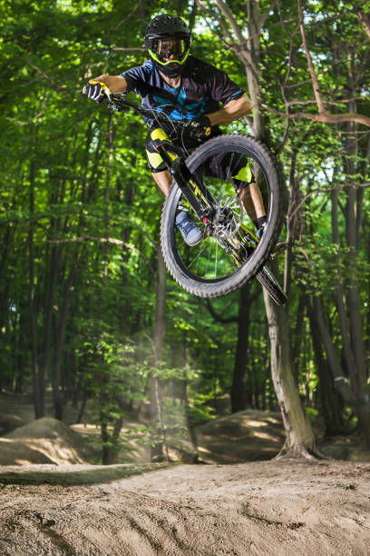 istock Man bikes in the green forest. 683715892