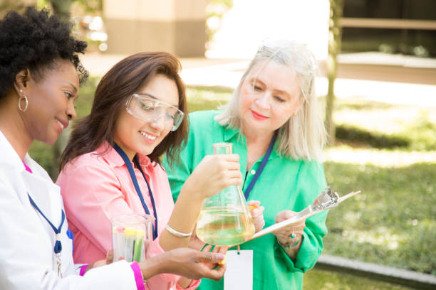 istock STEM themes with female scientists working on water project outdoors. 683718542