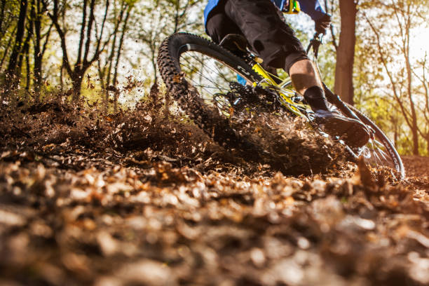 man riding a mountain bike Extreme sports. Mountain bike. Healthy life style and outdoor adventure mountain bike stock pictures, royalty-free photos & images