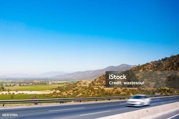 Highway Through The Mountains Stock Photo - Download Image Now - Asphalt, Blurred Motion, Car