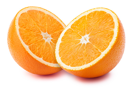 Perfectly retouched sliced halves of oranges isolated on the white background with clipping path