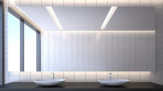 Toilet room with ceramic basins and mirror