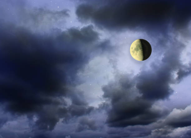 istock Moon glowing in the dark cloudy sky 683730802