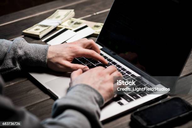 Hacker Using Laptop Stock Photo - Download Image Now - Adult, Adults Only, Blank Screen