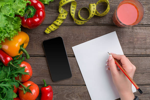 istock Concept diet, slimming plan with vegetables top view mock up 683739546