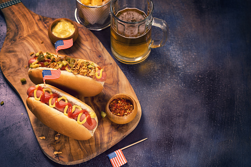 Homemade American hotdog with condiments for 4th of July celebration