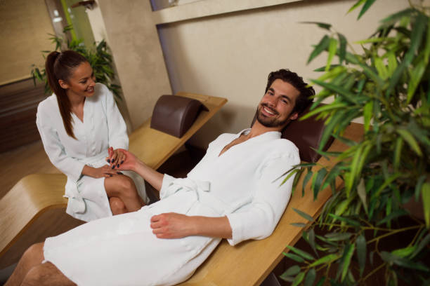 istock Young heterosexual couple having fun at health spa. 683743186