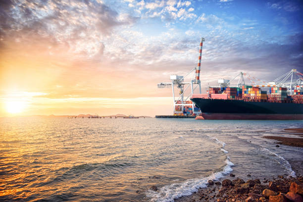 istock Logistics import export background of Container Cargo ship in the ocean st sunset sky, Freight Transportation 683743462